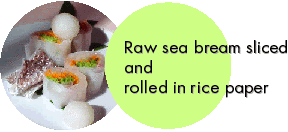 Raw sea bream sliced and rolled in rice paper